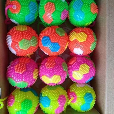 Description Spiky Light Up LED Ball Multi-colors Flashing Squeaky Ball